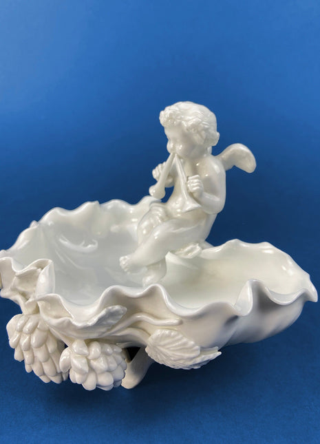 White Porcelain Cupid Soap Dish. Cupid Playing Flutes. Beautifully Detailed Flora & Fauna. Gilman Coll. "Amore", NY. Original Gift of Love.