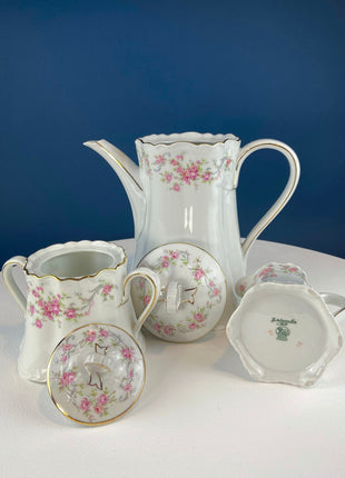 Antique Hutschenreuther Porcelain Tea Set. Teapot, Sugar Jar, Creamer, 2 Small Dessert Plates, and Set of 5 Tea Cups/Saucers. Rose Motif.
