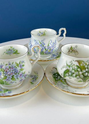 Vintage Collection of Teacups and Saucers. Set of Three. Royal Albert Sonnet Series: Lilly of the Valley, Blue Bells, and Forget-me-Nots.