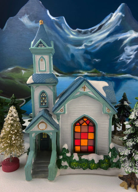 Christmas Village Cedar Valley Chapel Towne Series. Illuminated Blue Church with Stained Glass Window. Santa's Workbench. Night Light.