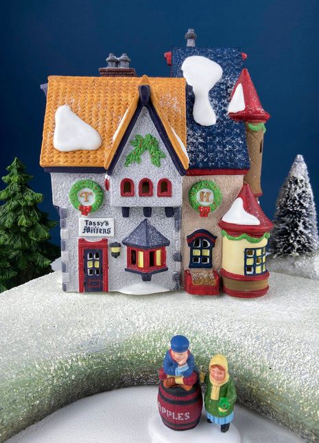 Tassy's Mittens and Hassel's Woolies. Illuminated Christmas Village House. North Pole Series. Alternative Christmas Holiday Decor.