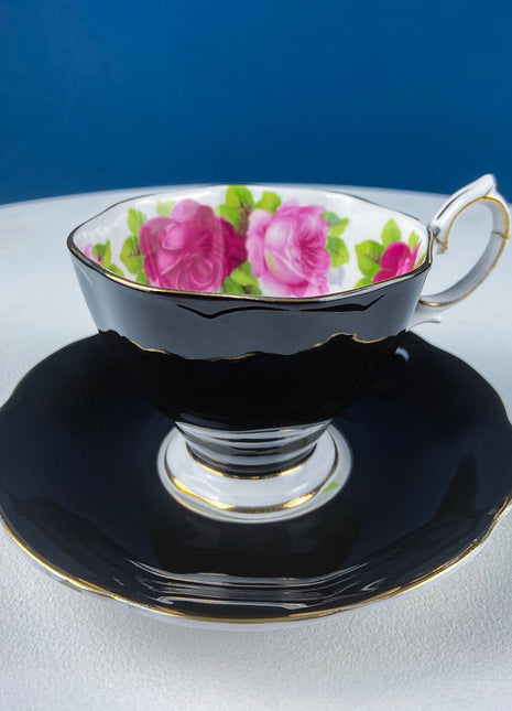 Black Cup and Saucer with Roses on White Background Inside the Cup. Royal Albert Old Country Rose Tea Set. Hand Painted Pink & Red Roses.