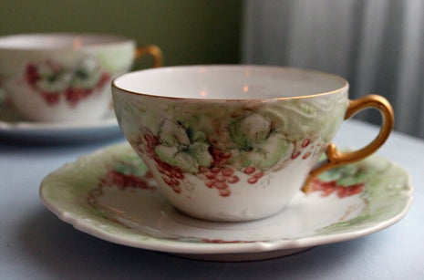 Antique Tea Cup with Saucer. Porcelain Tea Set with Hand Painted Current Fruit and Leaves, Scalloped Rim and Embossed Decoration.