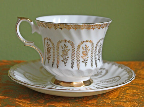 Teacup Saucer Set. Queen Anne Bone China Tea Set Decorated with 22-Karat Gold and Hand Painted Roses.