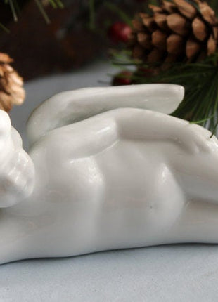 Cupid Figurine - Porcelain Angel Resting
