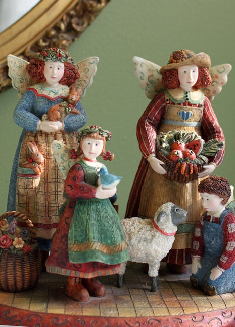 Angels Figurines. Porcelain Figurines Hand Made and Painted from Painting of Susan Winget.   Everyday Angels.