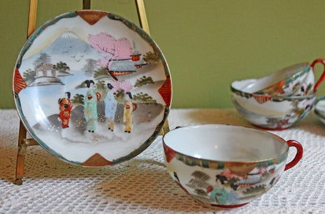 Antique Porcelain Cup & Saucer with Hand Painted Asian Scene