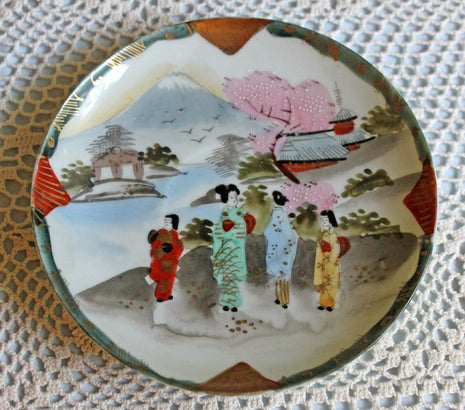 Antique Porcelain Cup & Saucer with Hand Painted Asian Scene