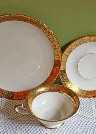 Antique Bavarian Porcelain Tea Trio. Porcelain Cup, Saucer, Dessert Plate in Gold and White. Tea Set by Eschenbach, Bavaria.