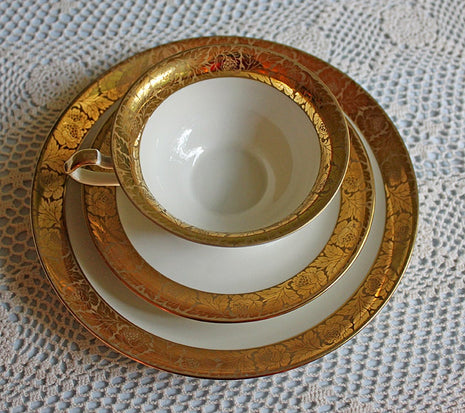Antique Bavarian Porcelain Tea Trio. Porcelain Cup, Saucer, Dessert Plate in Gold and White. Tea Set by Eschenbach, Bavaria.