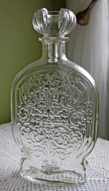 Vintage Clear Glass Bottle with Embossed Decor and Stopper - Schenley