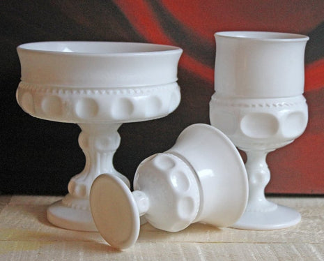 Westmoreland Milk Glass Footed Compote and Goblets. Set of Three Milk Glass Dishes with Thumbprint Pattern and Hobnails.